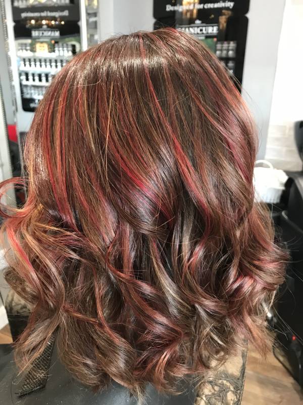 red high and low lights in cirled hair