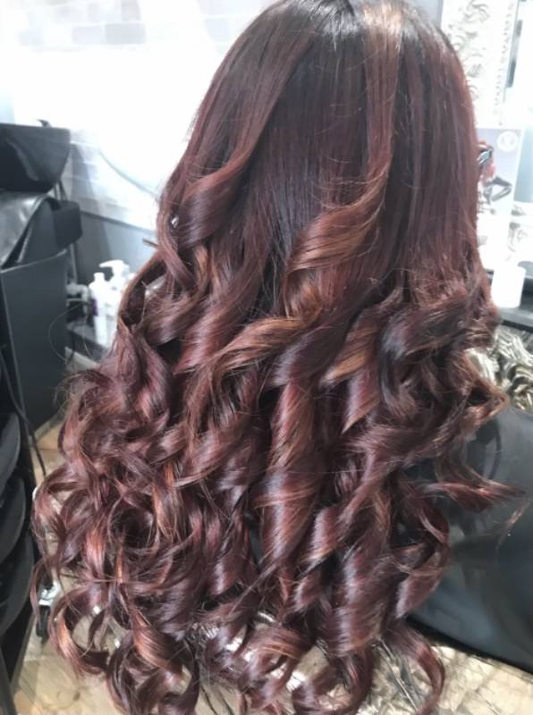 very long red curled hair