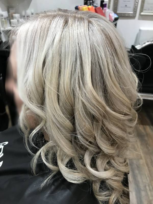 Ash blonde highlights curled